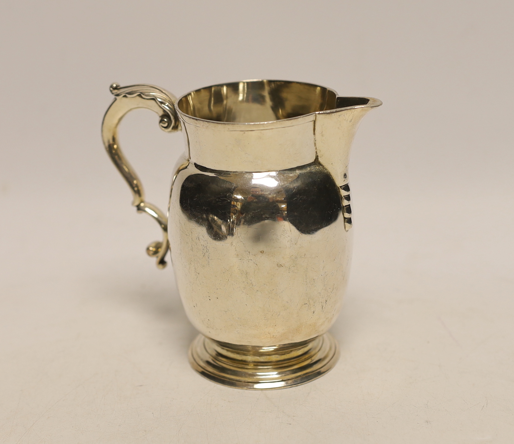 An early George III silver baluster jug, William Skeen, London, 1760, 11.1cm, 7.6oz.